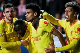 Liverpool&#039;s Luis Diaz (second from right) celebrates with teammates after scoring his side&#039;s third goal.