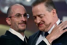US director Darren Aronofsky (left) and US-Canadian actor Brendan Fraser at the premiere of The Whale at the Venice Film Festival on Sept 4, 2022.