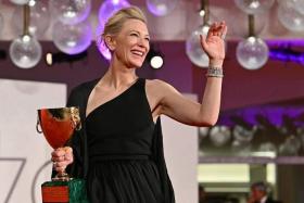Australian actress Cate Blanchett poses with the Coppa Volpi for Best Actress for Tar during the closing ceremony of the 79th annual Venice International Film Festival last Saturday.