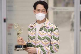 Lee Jung-jae at Incheon International Airport in Seoul  after winning a Best Actor Emmy on Sept 18, 2022.