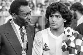 Brazilian and Argentinian legends Pele (left) and Diego Maradona in 1987.