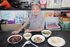 Madam Leong Yuet Meng at her Nam Seng Noodles &amp; Fried Rice stall at Far East Square in January 2019.