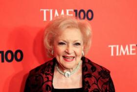 A 2010 photo shows Betty White arriving as a guest for a Time Magazine gala in New York.