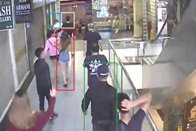 Tan Sen Yang (top left, in white) was seen on surveillance footage punching Mr Satheesh Noel Gobidass.