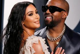 A 2020 photo shows Kim Kardashian and Kanye West attending the Vanity Fair Oscars party in Los Angeles, California.