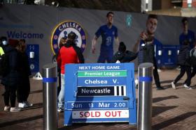 A match-day fixture sign outside Chelsea&#039;s Stamford Bridge stadium in London following Britain&#039;s imposing of sanctions on the club&#039;s Russian owner, Roman Abramovich.