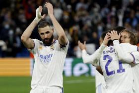 Real Madrid&#039;s Karim Benzema celebrates after the match.