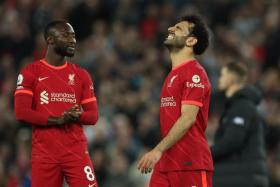 Liverpool&#039;s Mohamed Salah and Naby Keita look dejected after the match.