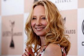 Actress Anne Heche, seen here in a 2011 photo, never regained consciousness after crashing her car, and irreversibly lost all brain function.