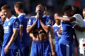 Leicester City&#039;s James Justin looks dejected after their match against Southampton.