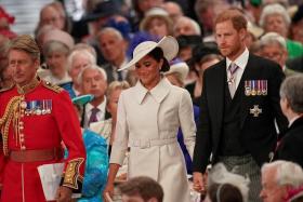 Britain&#039;s Prince Harry and Meghan, Duchess of Sussex, attend a service as part of celebrations for the Queen&#039;s Platinum Jubilee celebrations, in June 2022.
