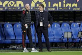 Manchester United manager Erik ten Hag (left) and director of football John Murtough during a friendly match in Spain on Dec 7, 2022.