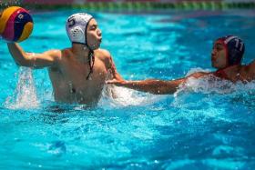 Singapore A’s Jayden See (white cap) in action against Indonesia at the Inter Nations Water Polo Cup in May 2022. The Singapore men's water polo are hoping to regain the SEA Games gold medal in Cambodia in May 2023. 