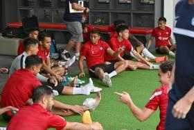 Singapore's Lions taking a break during a training session at the Kallang Foodball Hub on Dec 21, 2022. 