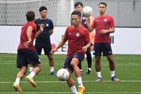 Lions winger Shawal Anuar (wearing yellow boots ) training at Jalan Besar Stadium on Thursday ahead of their AFF clash with Vietnam. 