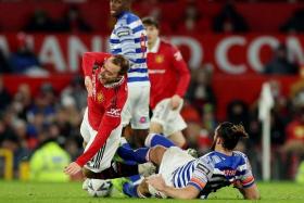 Manchester United&#039;s Christian Eriksen (left) was injured by Reading&#039;s Andy Carroll during their FA Cup clash on Jan 28.