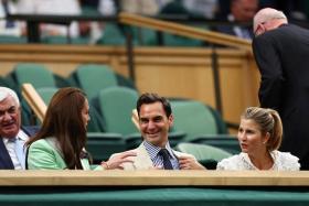 Eight-time Wimbledon champion Roger Federer with Catherine, Princess of Wales (left) and his wife Mirka in the royal box on July 4, 2023.