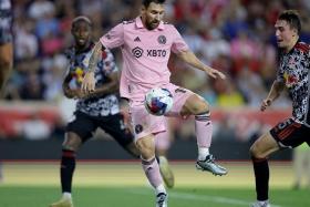 Inter Miami forward Lionel Messi (centre) against New York Red Bulls defender Andres Reyes during the Red Bull Arena on Aug 26. 
