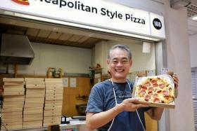 Mr Henry Teong set up 168 Neapolitan Style Pizza at Taman Jurong Food Centre to create a future job for his 16-year-old son Jonas, who has autism. 