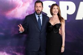 Adam Sandler and his wife Jackie at a special screening of the film Spaceman in Los Angeles on Feb 26.