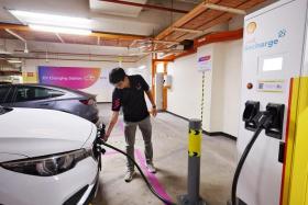 A new electric vehicle charging station at the carpark of HDB Hub on Jan 18, 2024.