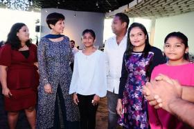 Minister in the Prime Minister’s Office Indranee Rajah (second from left) with Sinda beneficiaries at Sinda’s appreciation tea on Jan 21.