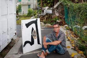 Artist Sunar Sugiyou with his artwork Wiseman (2023) at 11 Upper Wilkie Road, where his studio is located. 