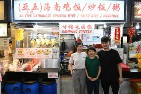 Siblings Natalie and Lex Lee with their mother June Ng at Ah Five Hainanese Chicken Rice.