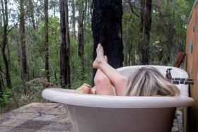 Take a soak in the forest while on the Earn Your Vino&#039;s Beneath The Surface retreat.