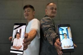 Local artistes Li Nanxing (left) and Gurmit Singh with their AI-generated avatars at a press conference to launch IdoLive on March 22.