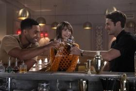 (From left) Lucien Laviscount, Lily Collins and Lucas Bravo in Emily In Paris 3.