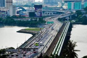 Travellers driving into Malaysia by car should expect waiting times of close to three hours for peak periods, said ICA.