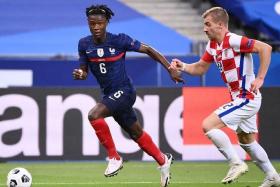 There is a lot of pressure on Eduardo Camavinga to shine in France&#039;s engine room as the defending world champions face Denmark, Australia and Tunisia in Group D.