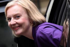 Britain&#039;s outgoing PM Liz Truss arriving at Conservative Party Headquarters in central London on Oct 19, 2022.