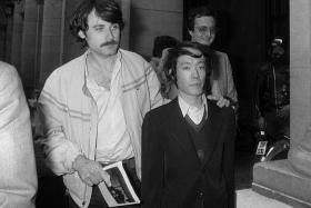 Issei Sagawa, known as the “Kobe Cannibal”, being escorted by French police in Paris on June 17, 1981.