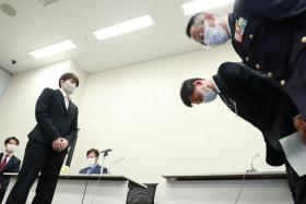 Members of Japan's self-defence force bowing to apologise to former soldier Rina Gonoi, on Sept 29, 2022.