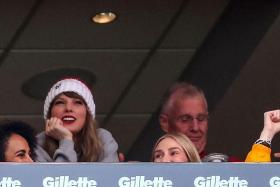 Taylor Swift and her father Scott Kingsley Swift (right) at the Gillette Stadium in Foxborough, Massachusetts, on Dec 17, 2023. 