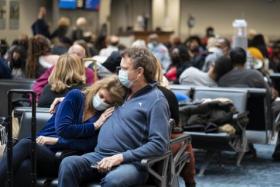 Passengers waiting at Hartsfield-Jackson International Airport in Atlanta on Dec 29, 2021.