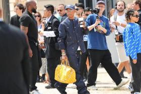 Pharrell Williams was spotted carrying the yellow version of the speedy at Paris fashion week this past summer.