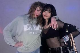 Blackpink's Lisa (right) met Taylor Swift in person backstage after the show.