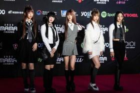 K-pop girl group NewJeans attending a red carpet event at the 2022 Mama Awards in Osaka on Nov 30, 2022.