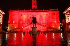 FILE PHOTO: The Campidoglio, Rome&#039;s city hall, is lit up in red to honour women who have been killed by men to mark International Day for the Elimination of Violence Against Women, in Rome, Italy, November 25, 2021. REUTERS/Remo Casilli/File Photo