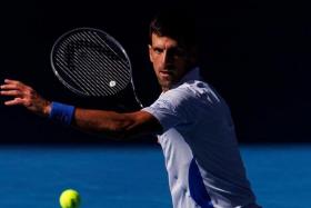 FILE PHOTO: Jan 26, 2024; Melbourne, Victoria, Australia;   Novak Djokovic of Serbia in action against Jannik Skinner of Italy in the semi-finals of the men?s singles at the Australian Open. Mandatory Credit: Mike Frey-USA TODAY Sports/File Photo