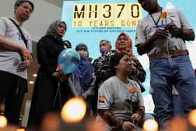 Families of passengers attending a remembrance event commemorating the 10th anniversary of the MH370 airplane's disappearance, on March 3. 