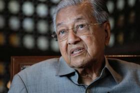 FILE PHOTO: Former Malaysian Prime Minister Mahathir Mohamad speaks during an interview with Reuters in Putrajaya, Malaysia November 8, 2022. REUTERS/Hasnoor Hussain/File Photo