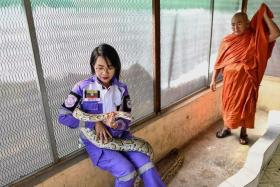 Ms Shwe Lei is part of Myanmar&#039;s premier snake removal squad called Shwe Metta.