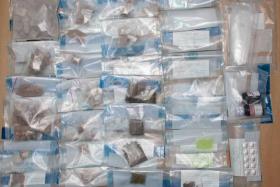 Drugs seized from a residential unit in Yishun Street 44 on March 5 included about 975g of heroin and more.