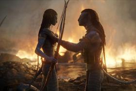 (From left) Neytiri (Zoe Saldana) and Jake Sully (Sam Worthington) in Avatar: The Way Of Water.