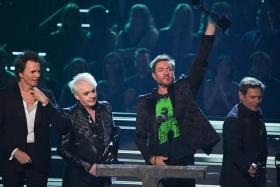 English band Duran Duran with their inductee trophy at the 37th Annual Rock and Roll Hall of Fame Induction Ceremony at the Microsoft Theatre on Nov 5, 2022.