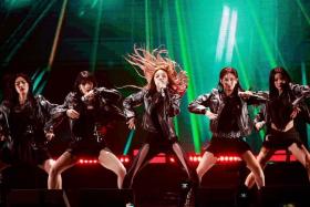 (G)I-dle members (from left) Shuhua, Minnie, Yuqi, Miyeon and Soyeon performing at the 2023 iHeartRadio Jingle Ball in California on Dec 1, 2023. 